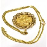 A VICTORIAN FULL SOVEREIGN (young head) dated 1881, encased in a marked 9.375 gold openwork mount,