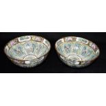 A PAIR OF CHINESE 'CABBAGE LEAF AND BUTTERFLY' BOWLS probably Republic period, seal type marks to