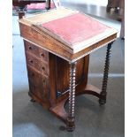 VICTORIAN ROSEWOOD DAVENPORT, the top having a brass galleried back, and sloping writing surface