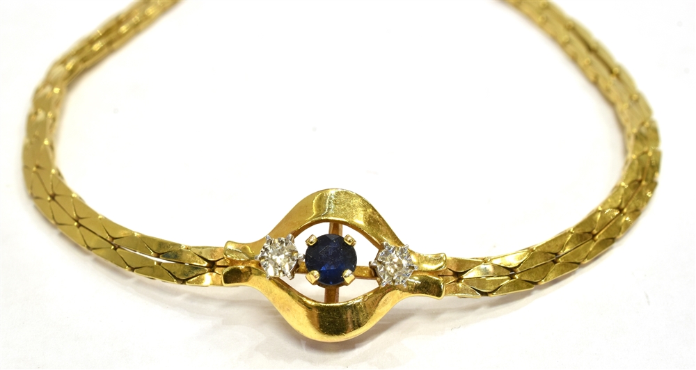 A 9CT GOLD DIAMOND AND SAPPHIRE BRACELET The central sapphire measuring approx. 3mm diameter and