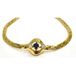 A 9CT GOLD DIAMOND AND SAPPHIRE BRACELET The central sapphire measuring approx. 3mm diameter and
