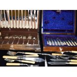 A CANTEEN OF A1 SILVER PLATED CUTLERY contained in a wooden box, together with another to include