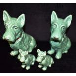 TWO PAIRS OF SYLVAC GREEN GLAZED MODELS OF TERRIERS the larger pair model 1209/Rd no 77850 29cm