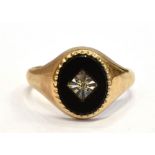 A DIAMOND SET 9CT GOLD SIGNET RING size X, faded and rubbed 375 markings, weight approx. 4.5grams