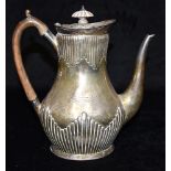 A VICTORIAN SILVER COFFEE POT with metal handle and lid top, ribbed design decoration to lid and