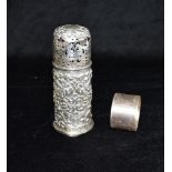 A SILVER SUGAR CASTER with heavy embossed floral scroll, hallmarked London, date letter P,