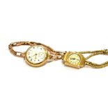 A LADIES 9CT GOLD VINTAGE BRACELET WATCH with an expanding strap, inner case hallmarked for