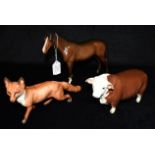 THREE BESWICK ANIMAL FIGURES: a Hereford bull 'Ch. of Champions'; standing