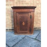 AN OAK WALL HANGING CORNER CABINET, H 96cm x W 79cm x D 42cm Condition Report : Damage to the top