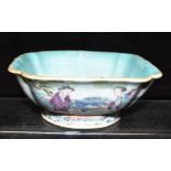 A CHINESE PORCELAIN SQUARE SHAPED BOWL the exterior with enamelled decoration of figures in a garden