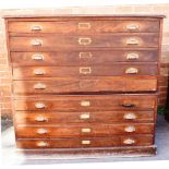 A STAINED PLAN CHEST of nine drawer configuration H 118cm x W 124cm x D 94cm