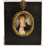 A 19TH CENTURY OVAL PORTRAIT MINIATURE of a young gentleman, watercolour/gouache on ivory, in