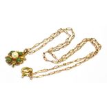 A 9CT GOLD PEARL AND STONE SET NECKLACE Comprising a central pearl set in a marked 9ct gold star
