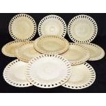 TWELVE CONTINENTAL CREAMWARE RIBBON PLATES with basket weave relief moulded decoration, impressed