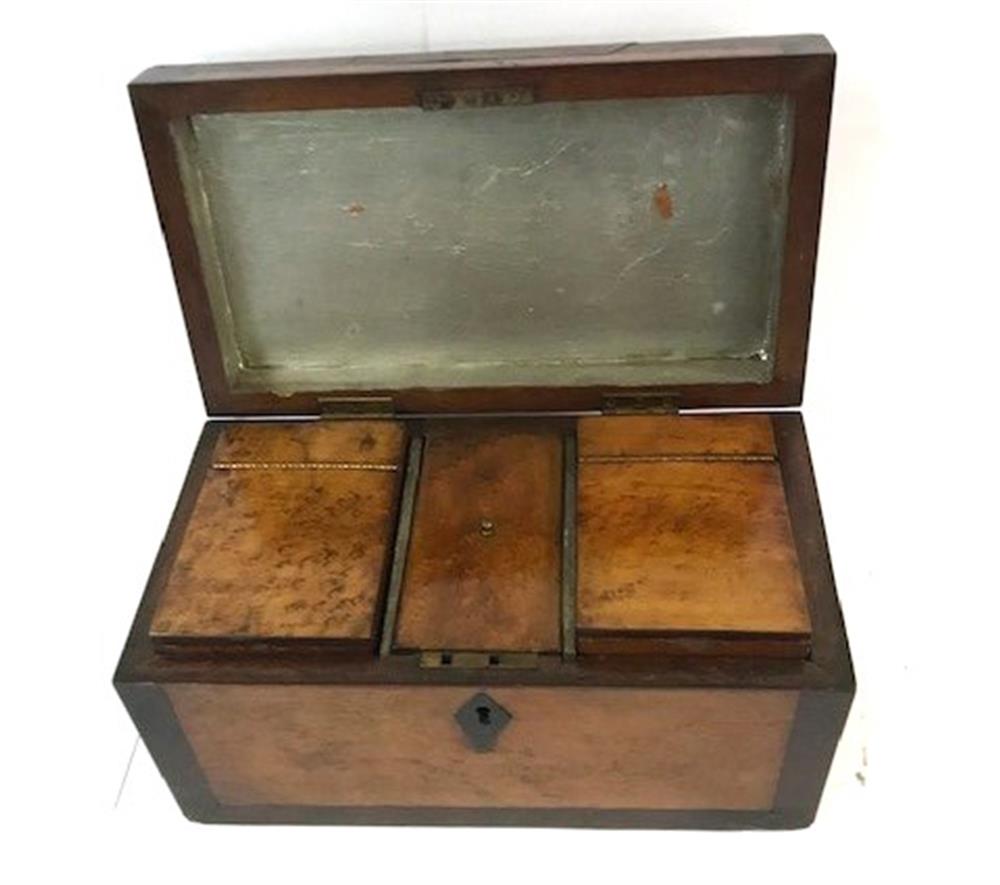 A 19TH CENTURY WALNUT TEA CADDY having an escutcheon to the centre, the hinged top opening to reveal - Image 2 of 2