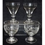 A PAIR OF 19TH CENTURY GLASS RUMMERS each engraved 'M A Popham Ring of Bells Taunton 1868', 13.5cm