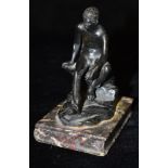 AFTER THE ANTIQUE: a patinated bronze figure of the seated Mercury, on marble base, 13cm high