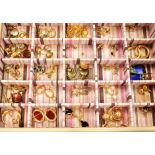A COLLECTION OF EARRINGS/PENDANT PARTS Loose items that include various earrings/pendant parts and a