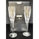 JOHN ROCHA FOR WATERFORD CRYSTAL: a pair of Champagne flutes, 26cm high, boxed Condition Report :