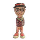 A KURAMOCHI (CK, JAPAN) TINPLATE HAROLD LLOYD FIGURE with a clockwork mechanism, 28cm high.