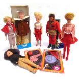 ASSORTED PLASTIC DOLLS including an early Sindy, all but one unboxed (Action Man lacking one thumb);