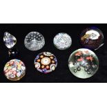 A COLLECTION OF GLASS PAPERWEIGHTS comprising a Perthshire millefiore example dated 1991, the