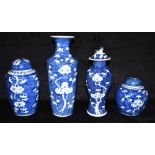 FOUR VARIOUS CHINESE JARS/VASES each decorated with prunus blossom on a cracked ice ground, and