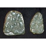 TWO CHINESE CARVED HARDSTONE CARVINGS each relief decorated with shoals of fish, 6cm and 5cm high