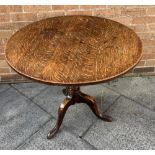 AN OAK CIRCULAR TILT TOP TABLE H 72.5cm Diameter 85.5cm