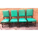 SET OF FOUR EBONISED DINING CHAIRS in green leather, H 101cm Condition Report : In need of being