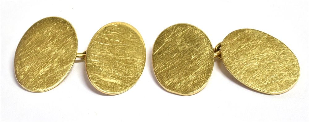 A PAIR OF 9CT GOLD OVAL CUFFLINKS Measuring approx. 1.7 cm by 1.2 cm Hallmarked for London 1989