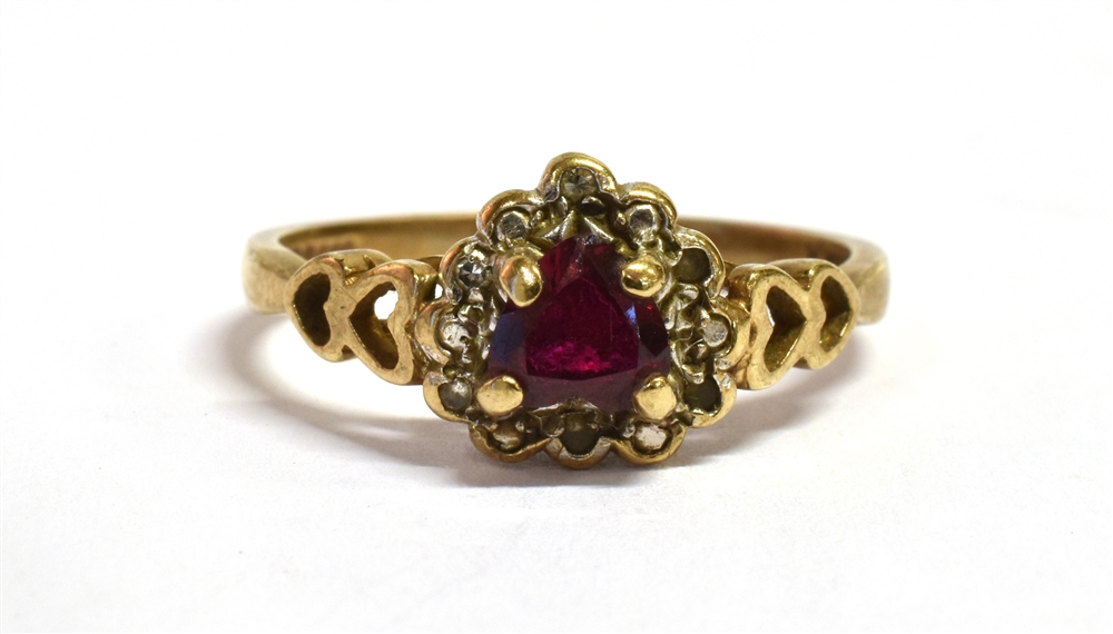 A 9CT GOLD RUBY SET RING With the central ruby shaped as a heart and the ring shoulders of open work - Image 3 of 4