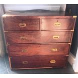 MAHOGANY CAMPAIGN CHEST OF TWO SHORT OVER THREE LONG DRAWERS in two section, with each drawer having