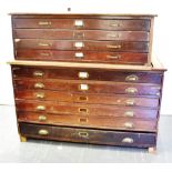 A STAINED PLAN CHEST of four drawer configuration, H 43cm x W 127cm x D 90cm, together with a