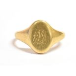 A 18ct GOLD SIGNET RING with a monogrammed initial cartouche, hallmarked for Birmingham with faded