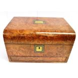 WALNUT VANITY BOX the interior having fitted compartments containing glass bottles and glass