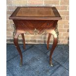 A FRENCH RECTANGULAR OCCASIONAL TABLE having a single frieze drawer, with gilt metal decoration