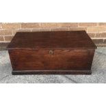A STAINED PINE STORAGE BOX of rectangular form, with metal escutcheon and a key H 28.5CM X 75.5cm