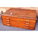 A PINE PLAN CHEST of four drawer confirguration, H 42cm x W 123cm x D 88cm