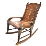 A BENTWOOD AND MAHOGANY FRAMED CHILD'S ROCKING CHAIR 58cm high