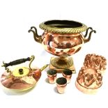 A MIXED COLLECTION OF COPPERWARE including two Benham & Frowde copper jelly moulds, the oval example