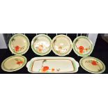 A CLARICE CLIFF SANDWICH SET comprising rectangular shaped plate 30.5cm wide and six circular plates