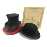 A FOLDING OPERA TOP HAT by Herbert Johnson, London, internal circumference approximately 54cm (one