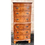 20TH CENTURY BURR WALNUT AND MAHOGANY BOWFRONTED CHEST ON CHEST OF SIX DRAWERS of narrow