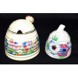 A CLARICE CLIFF NEWPORT POTTERY 'RADIANCE' BEEHIVE PATTERN HONEY POT with bee finial, stamped to