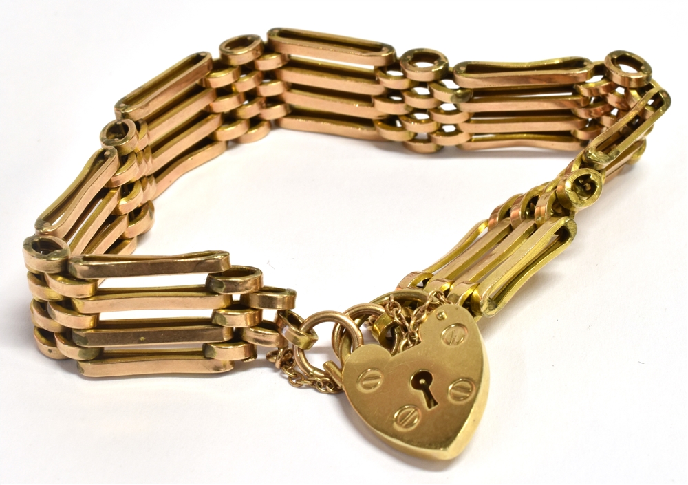 A 9CT GOLD FOUR GATE BRACELET With heart padlock, weight approx. 16 grams