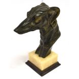 A FIGURE OF THE HEAD OF A GREYHOUND Raised on a square base, Ht 26 cm