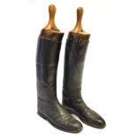 A PAIR OF GENTLEMAN'S BLACK LEATHER RIDING BOOTS with trees, approximately size 9.