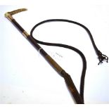 A HUNTING WHIP by Swaine and Adeney London, with antler grip, twin gold collars and with half