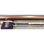 A HARDY SPECIAL THREE-PIECE CARBON FIBRE ROD 9ft (274cm) long, in a Hardy navy blue canvas slip.